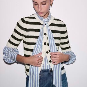 Short sleeve cardigan.
